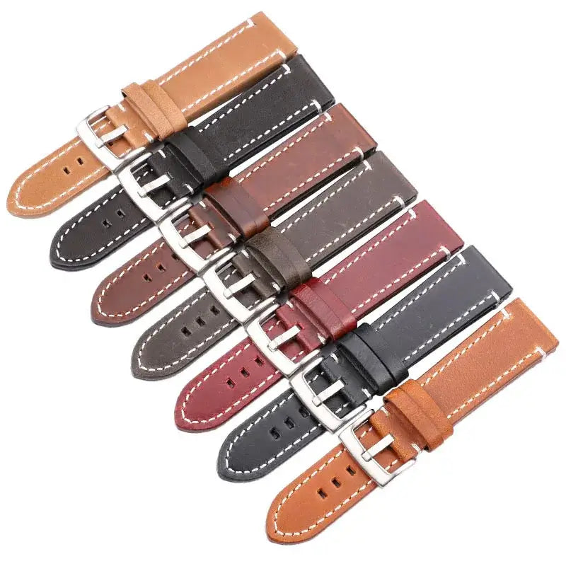 A variety of leather Suunto watch bands in different colors, showcasing durability and style for active users.