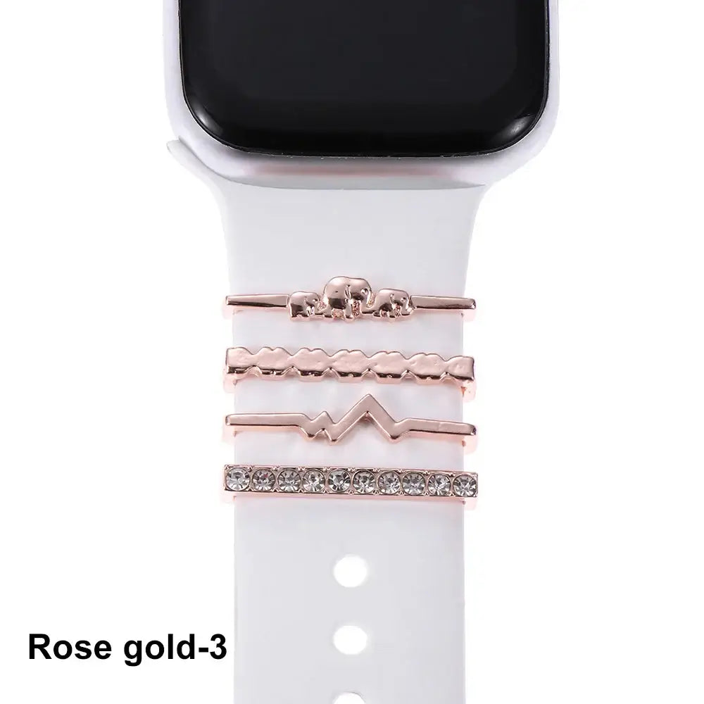 Decorative rose gold metal charms for Apple Watch bands, enhancing style and elegance.