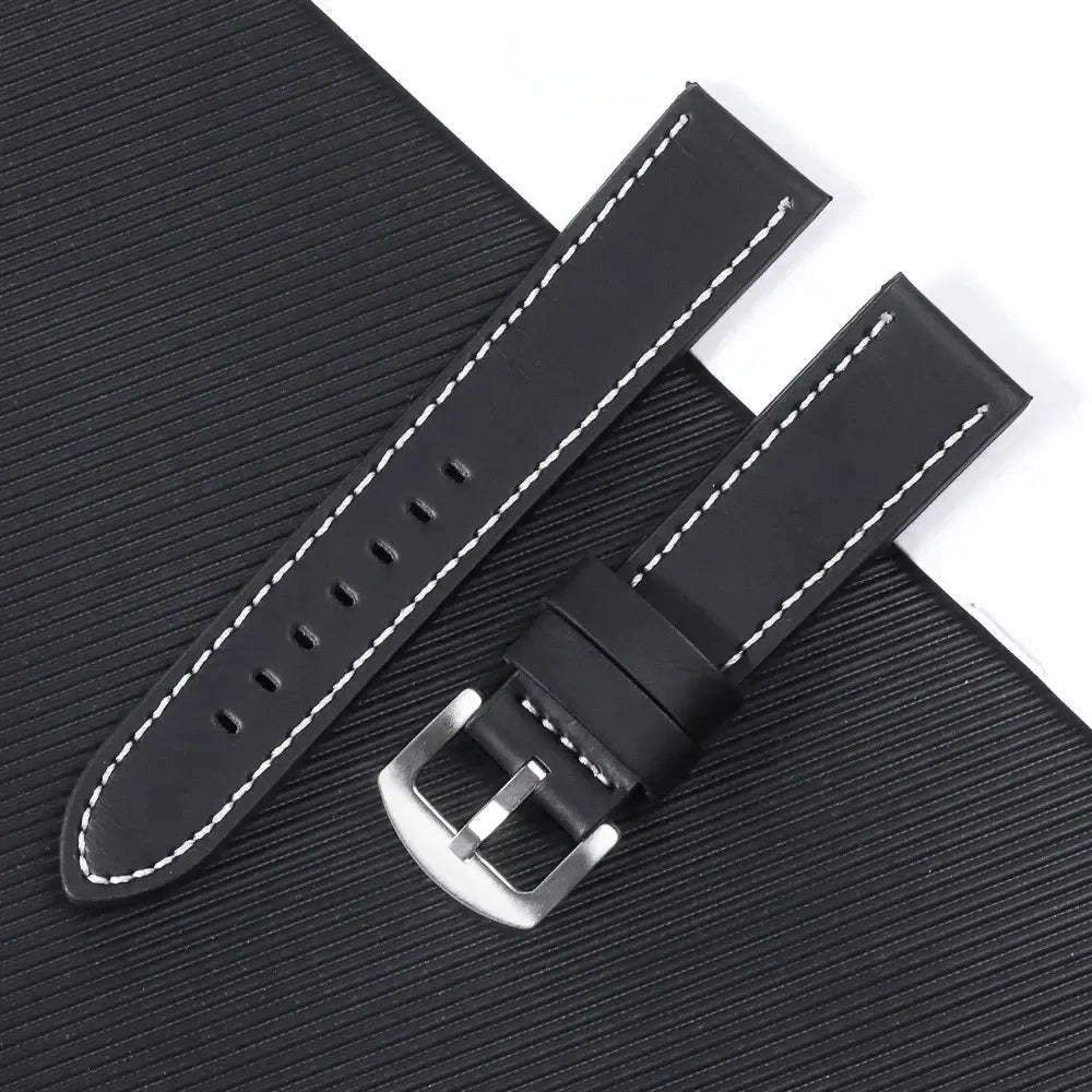 Black leather Suunto watch band with white stitching and silver buckle, designed for sleek smartwatch transformation.