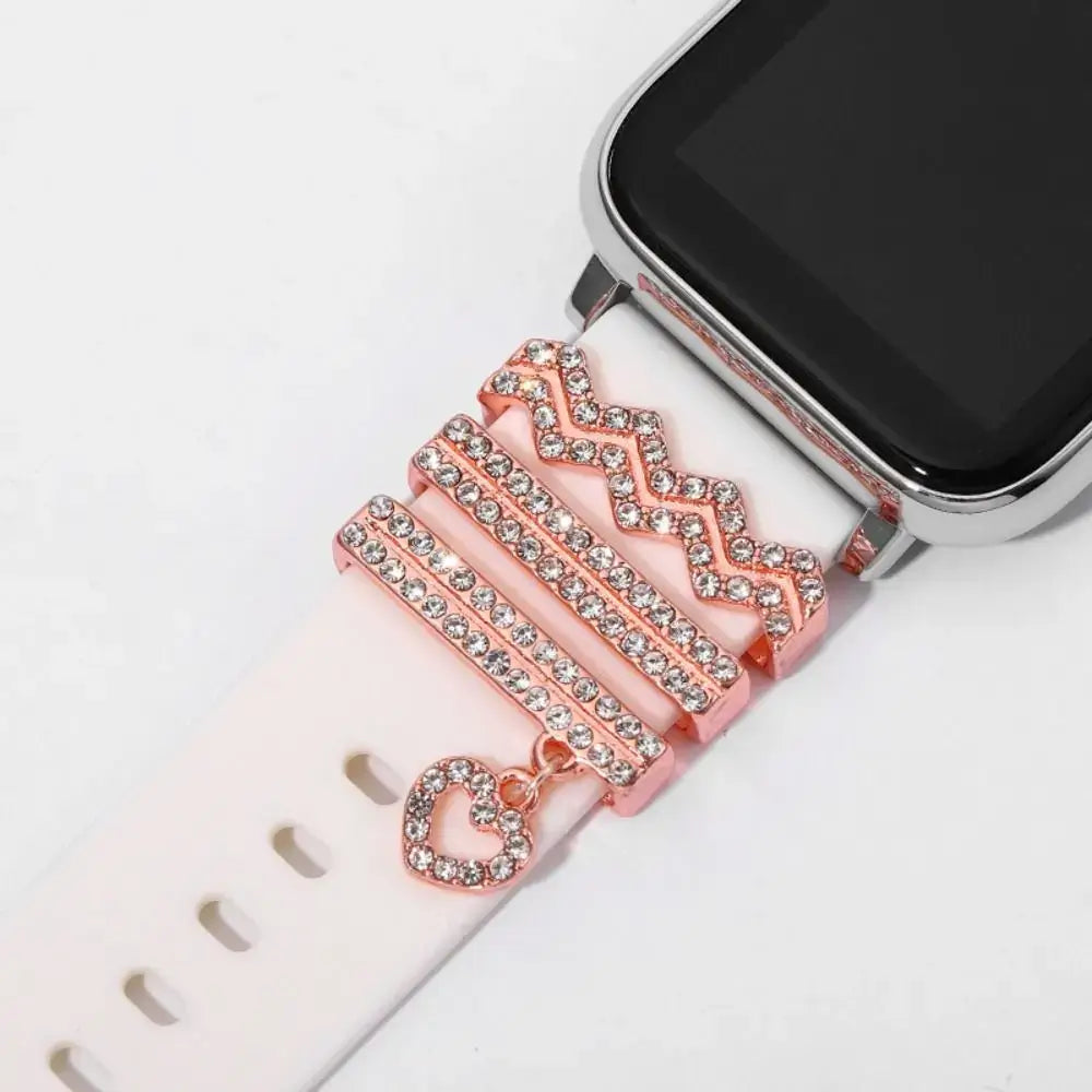 Decorative metal charms for Apple bands featuring pink and white design, enhancing smartwatch style and elegance.