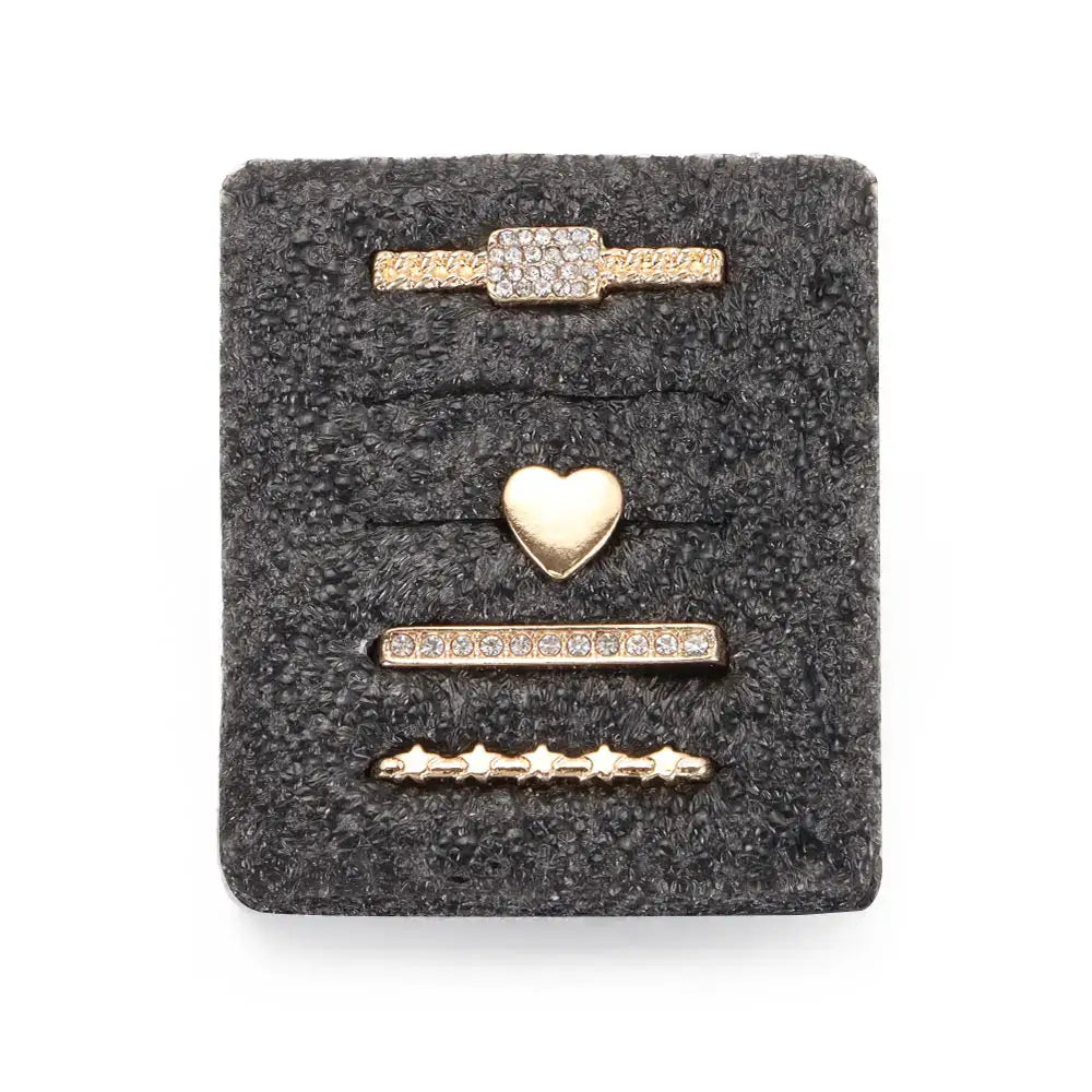 Set of decorative gold metal charms for Apple Watch bands, featuring heart and star designs with rhinestones.