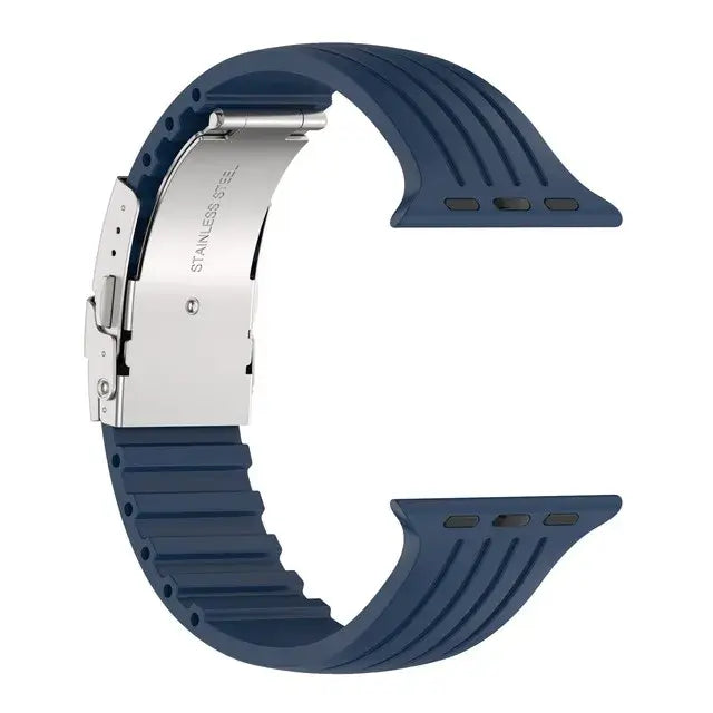 Silicone Apple Watch band in navy blue with stainless steel buckle, perfect for style and durability.