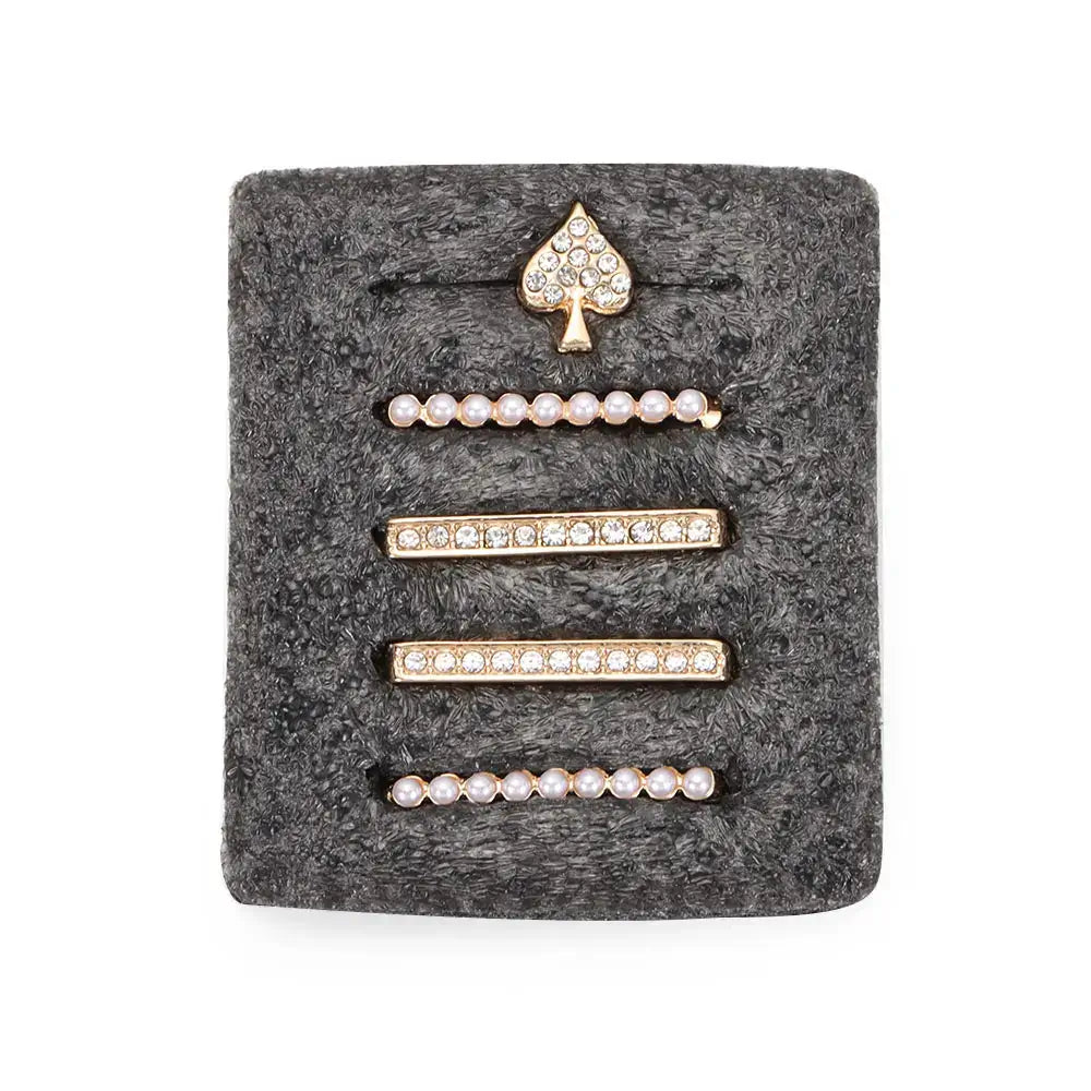 Decorative metal charms for Apple Watch bands featuring pearl and rhinestone designs, adding style and personalization.