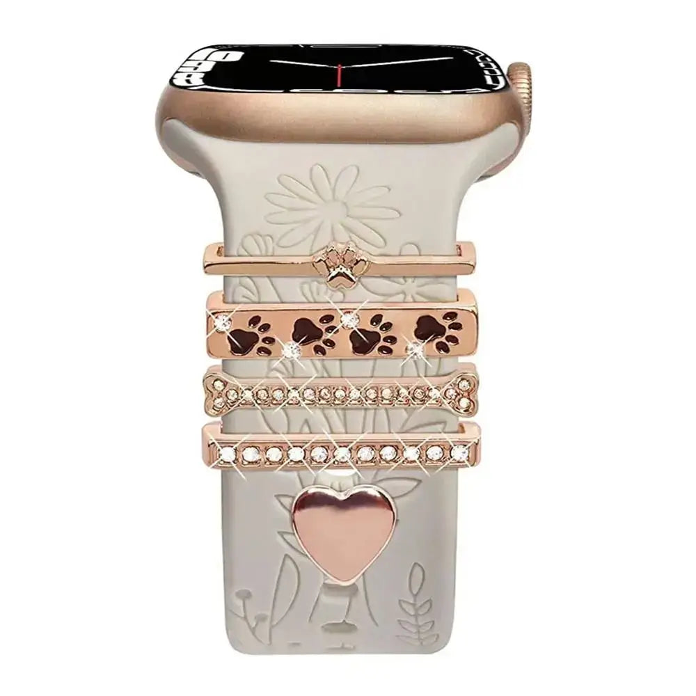 Decorative metal charms for Apple Watch bands featuring elegant designs and cute paw prints.