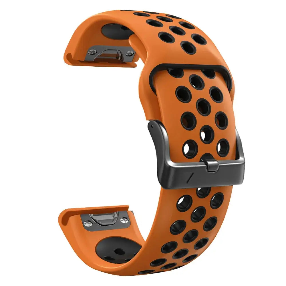Breathable orange silicone Garmin band with black perforations, perfect for a modern minimalist style.