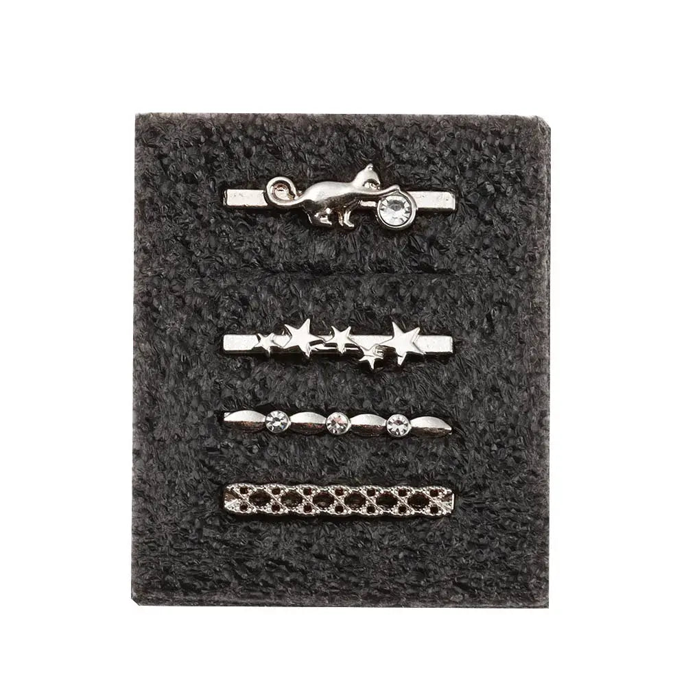 Set of decorative metal charms for Apple Watch bands featuring a cat, stars, and stylish designs. Personalize your look!
