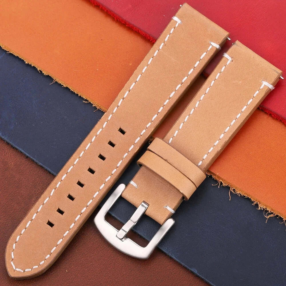 Stylish tan leather Suunto watch band featuring white stitching, perfect for active lifestyles and durability.
