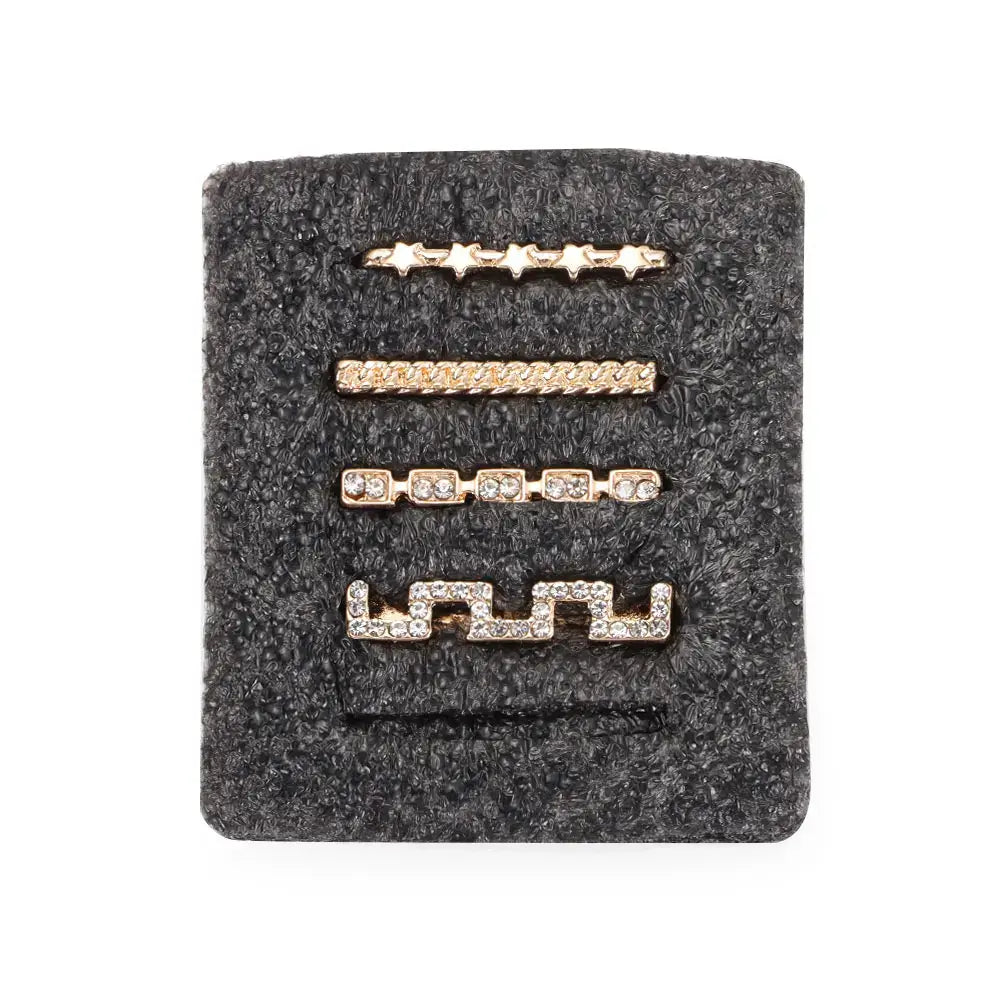 Decorative metal charms set for Apple Watch bands featuring unique designs and sparkling accents.