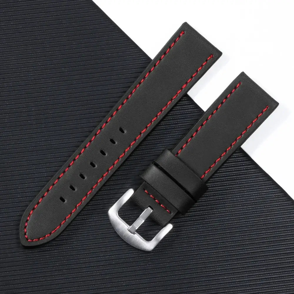 Black leather Samsung Galaxy Watch strap with red stitching, designed for style and durability, fits 20mm watches.