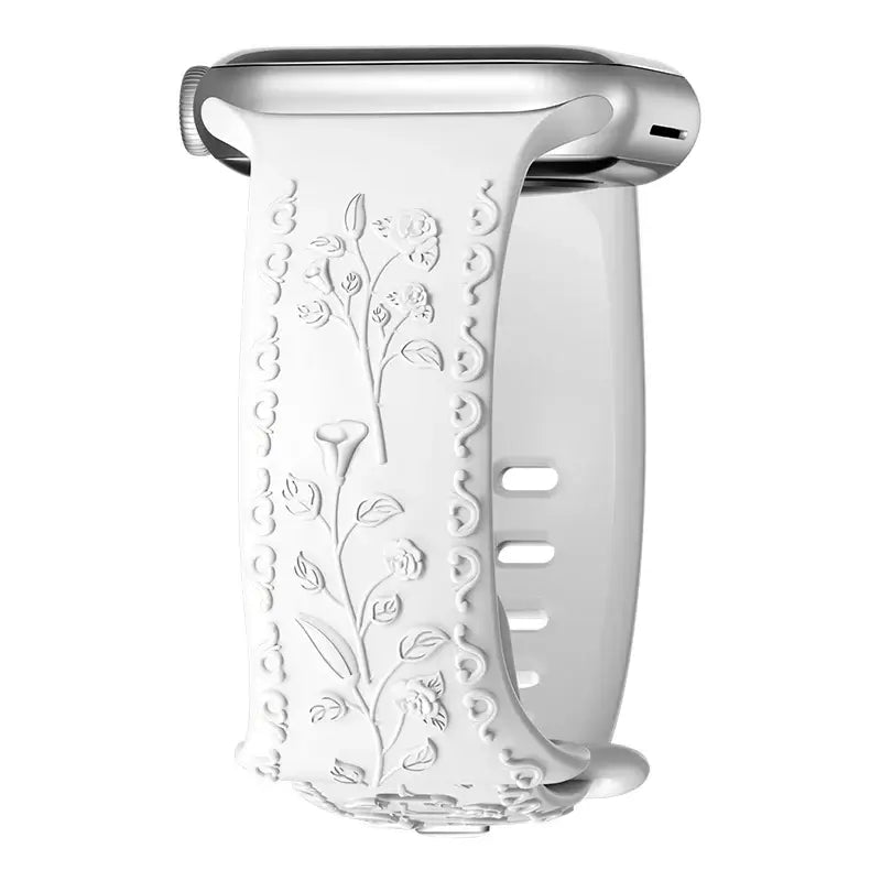 Flower engraved white Apple Watch band, stylish and durable for enhanced daily wear.