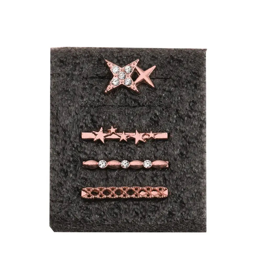 Decorative metal charms for Apple Watch bands featuring star and bead designs in rose gold. Perfect for personalization and style.