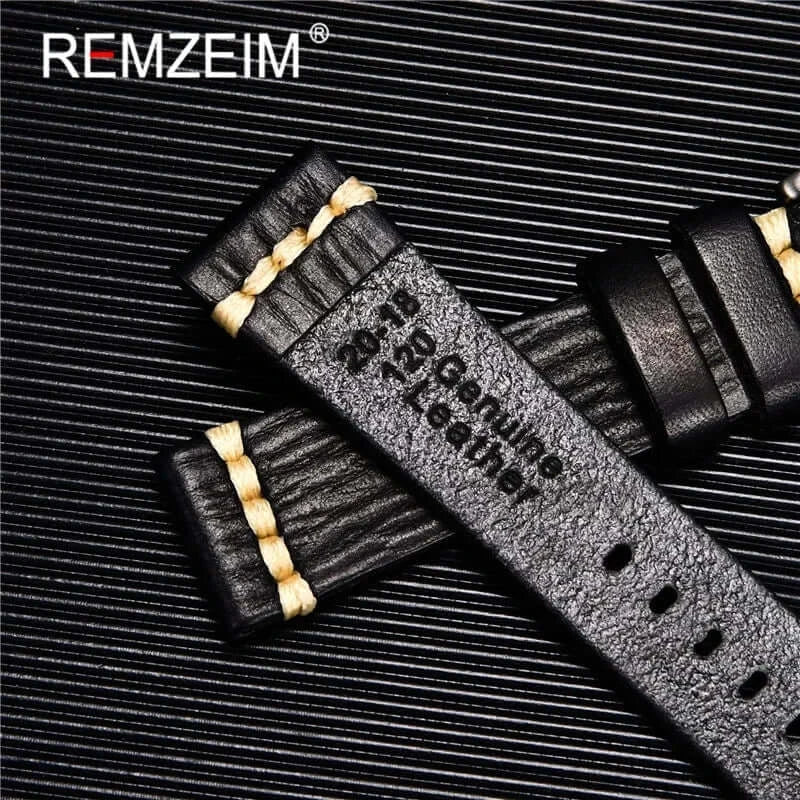 Black leather watch band with textured design and cream stitching for Suunto watches. Durable and stylish accessory.