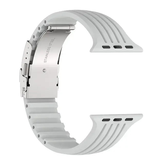 Silicone Apple Watch band with metal buckle, featuring a sleek design and durable comfort for any occasion.