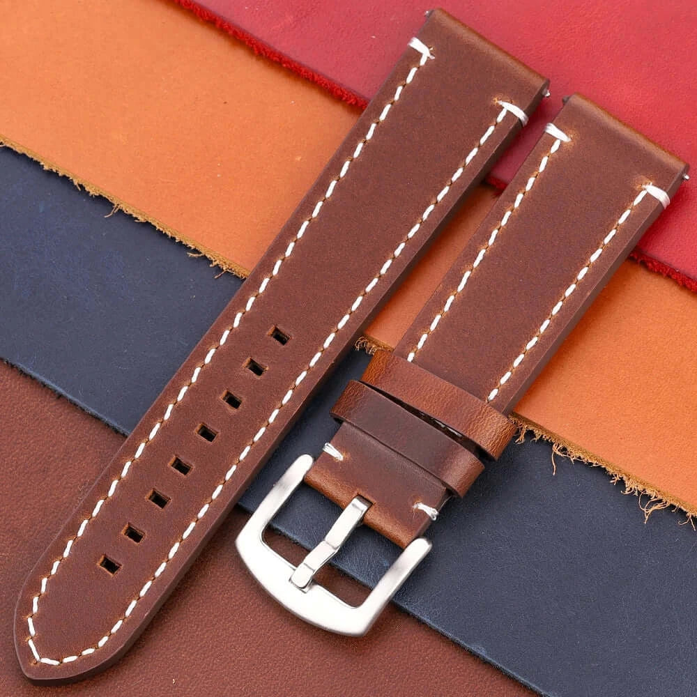 Durable brown leather Suunto watch band with white stitching, designed for style and comfort during active use.