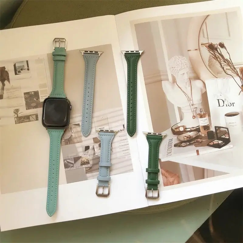 Slim leather straps in various colors for Apple Watch, showcasing style and sophistication on a chic magazine spread.