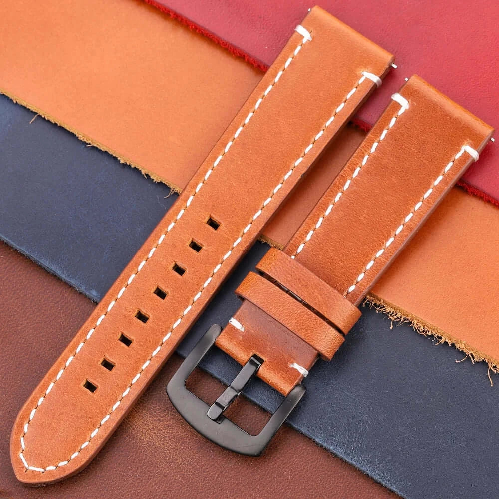 Leather Suunto watch band in tan color, showcasing stylish stitching and durable design against various leather swatches.