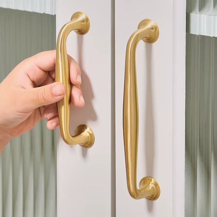 Arched solid brass cabinet pull in brushed brass