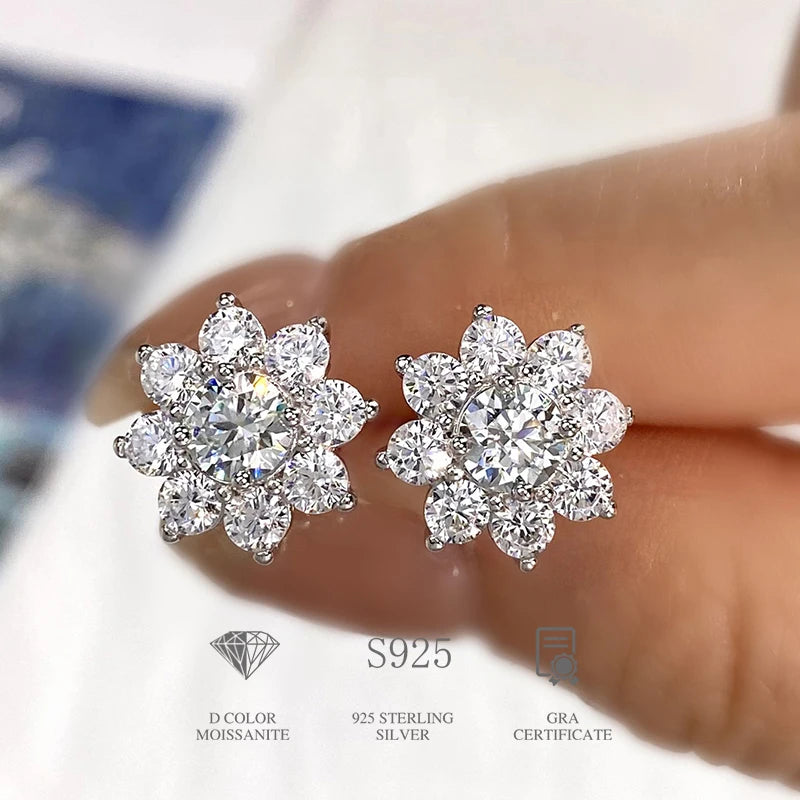 Flower Halo Moissanite Stud Earrings in Sterling Silver - Flower halo fronts on hand
