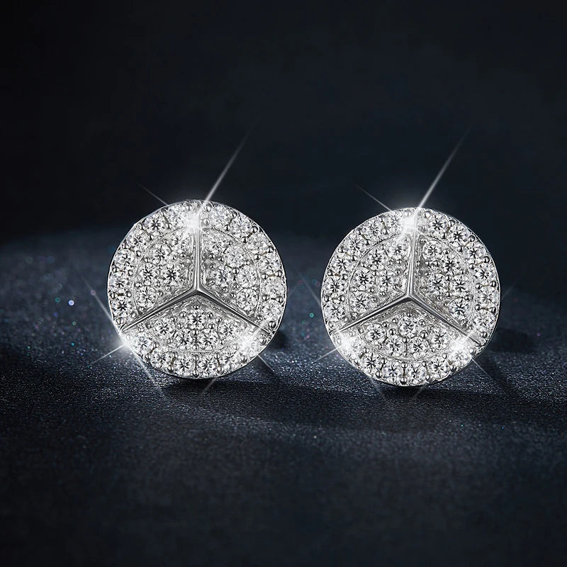 Geometric Round Pavé Moissanite Stud Earrings in Silver — Pair on dark surface