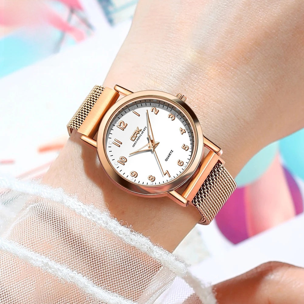 Women's Arabic Numeral Mesh Quartz Watch — Rose gold-tone watch worn on wrist — BandsCo Straps