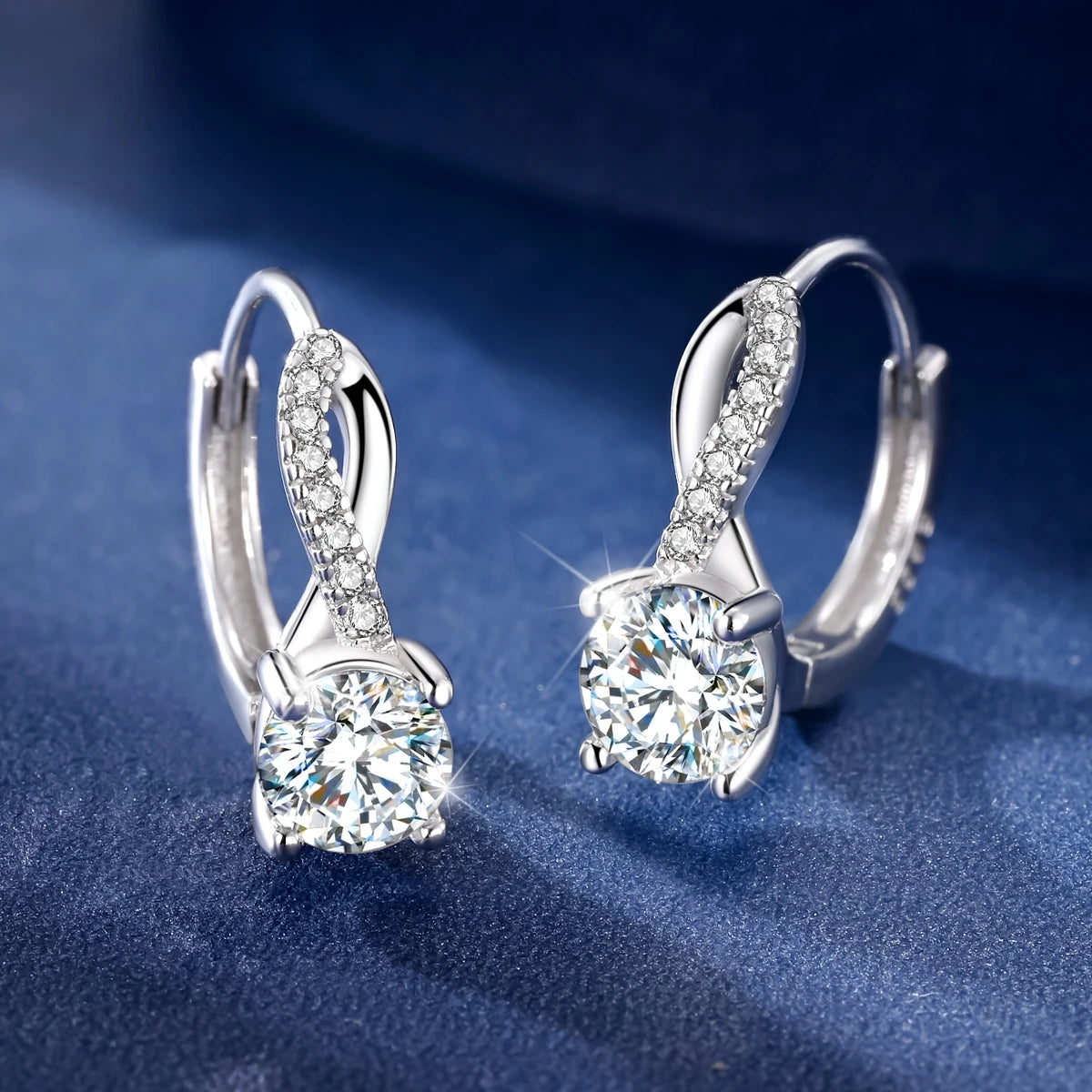 Crossover Moissanite Hoop Earrings in Sterling Silver — Crossover hoops, front and side