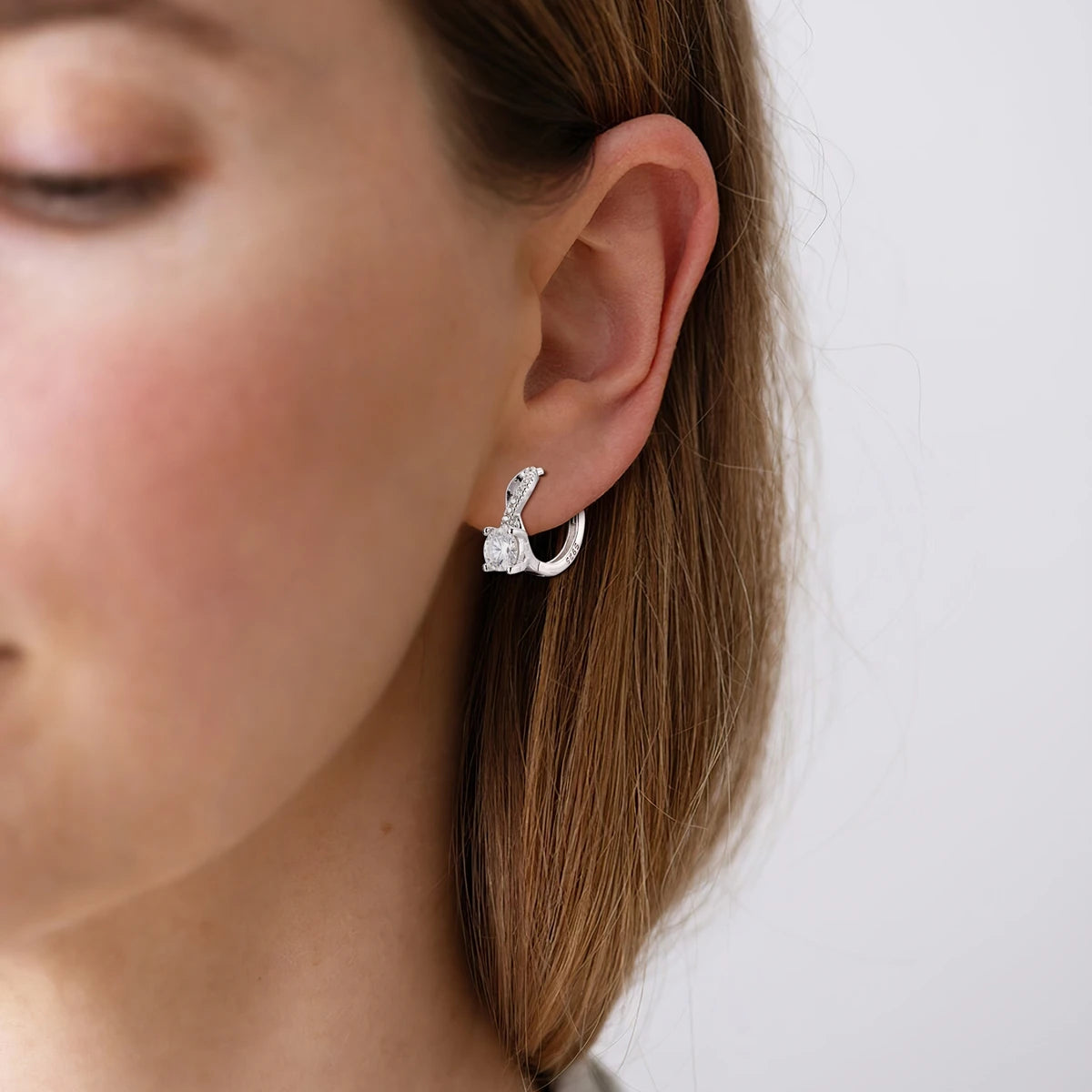 Crossover Moissanite Hoop Earrings in Sterling Silver — Hoops worn on the ear