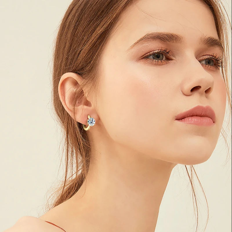 Six-Prong Moissanite Solitaire Hoop Earrings in Silver — Worn on ear
