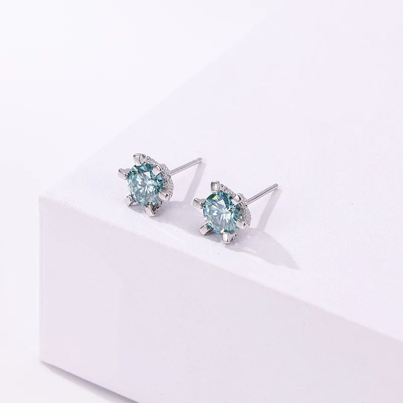 Colored Moissanite Stud Earrings with Sparkling Basket Settings - Blue stones angled view