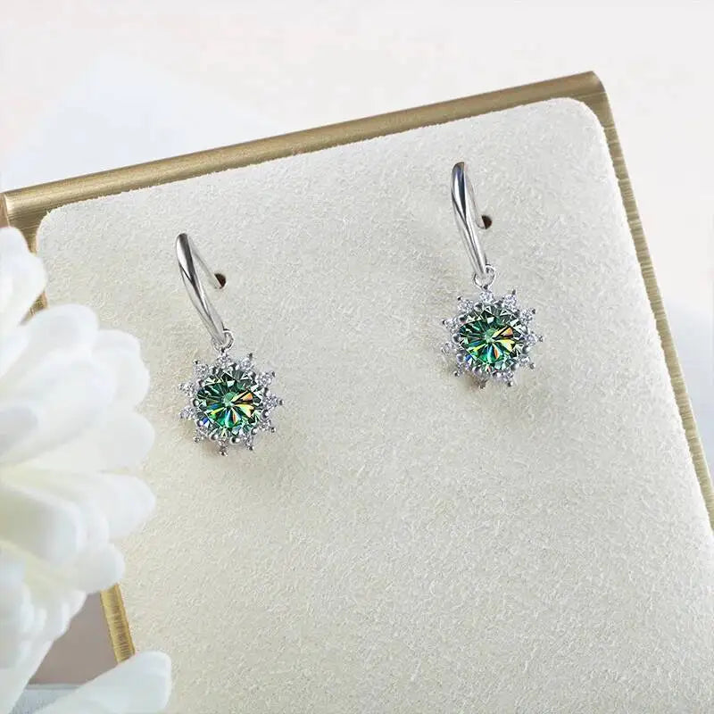 Colorful Sunburst Moissanite Drop Earrings in Sterling Silver — Green drops, angled view