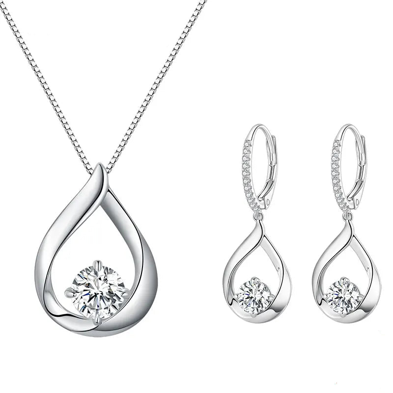 Moissanite Waterdrop Earrings or Necklace in Sterling Silver — Coordinating earrings and necklace shown together — BandsCo Straps