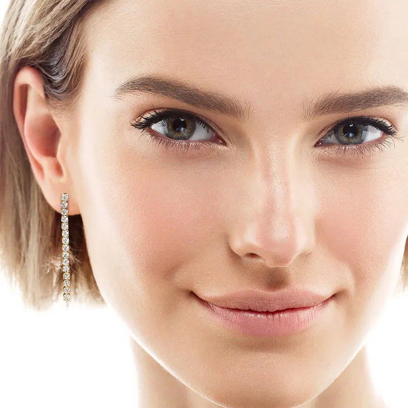 Moissanite Tennis Chain Drop Earrings in Sterling Silver — Slender drops worn
