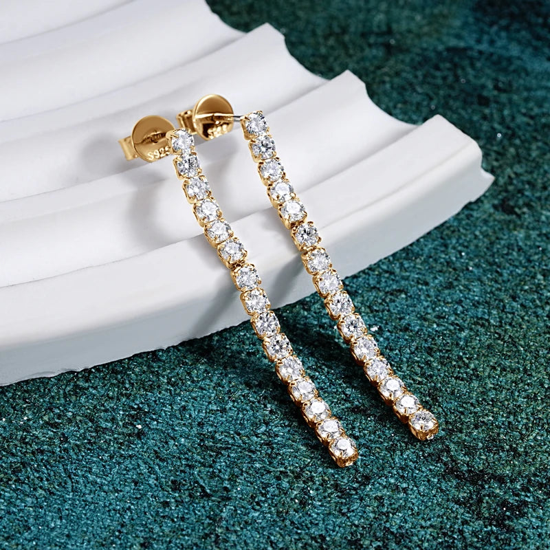 Moissanite Tennis Chain Drop Earrings in Sterling Silver — Gold-tone drops on display
