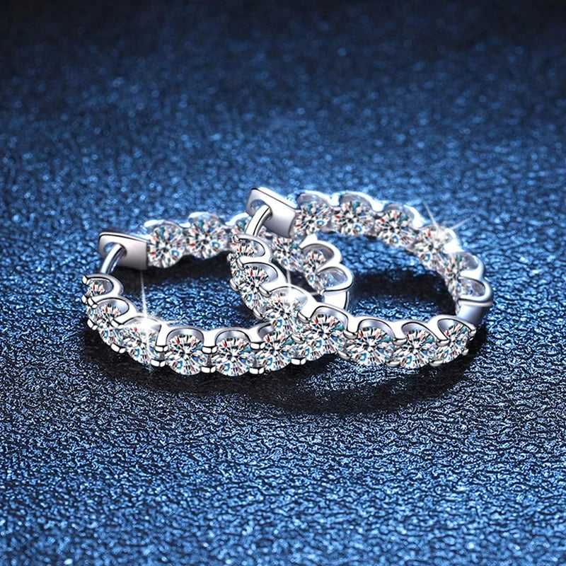 Round Moissanite Hoop Earrings in Plated Sterling Silver — Hoop pair on blue