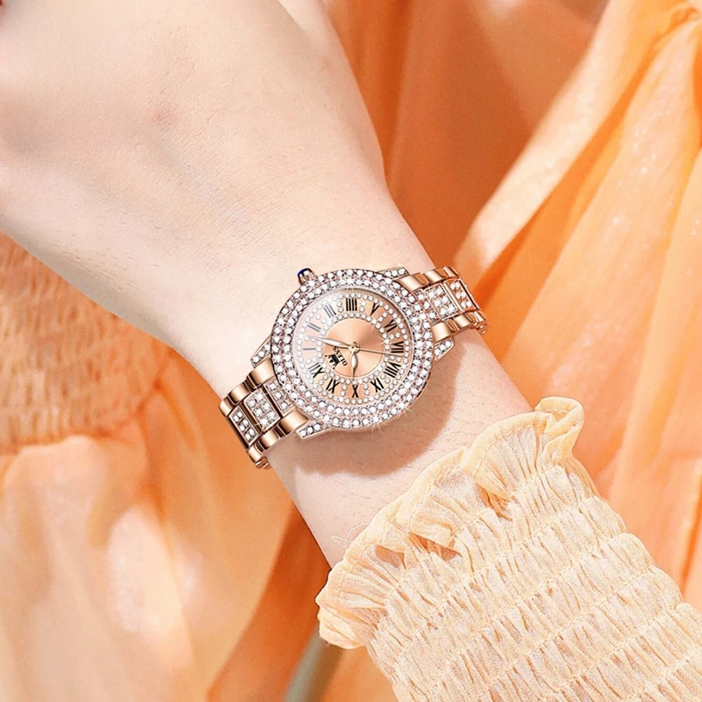 Women's Rose Gold-Tone Crystal Roman Numeral Watch — Crystal ring dial watch worn on wrist