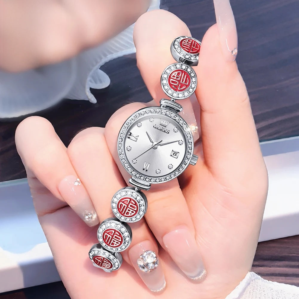 Women's Medallion Bracelet Crystal Quartz Watch — White dial medallion watch held in hand — BandsCo Straps