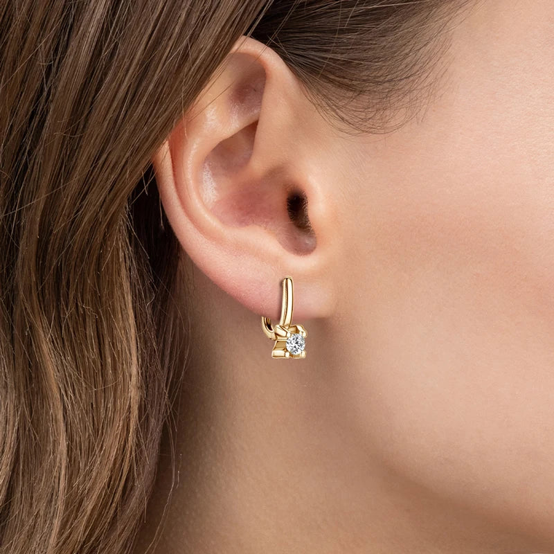 Moissanite Leverback Drop Earrings in Sterling Silver — Gold-Tone earrings worn on the ear