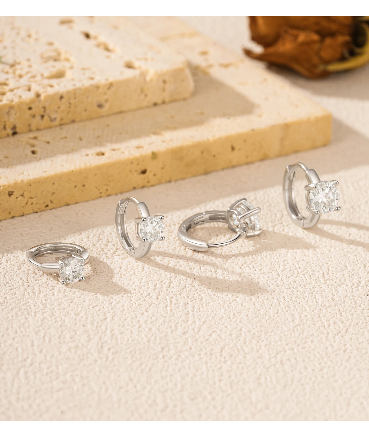 Round Solitaire Moissanite Hoop Earrings in Sterling Silver - Open hinges and stone settings