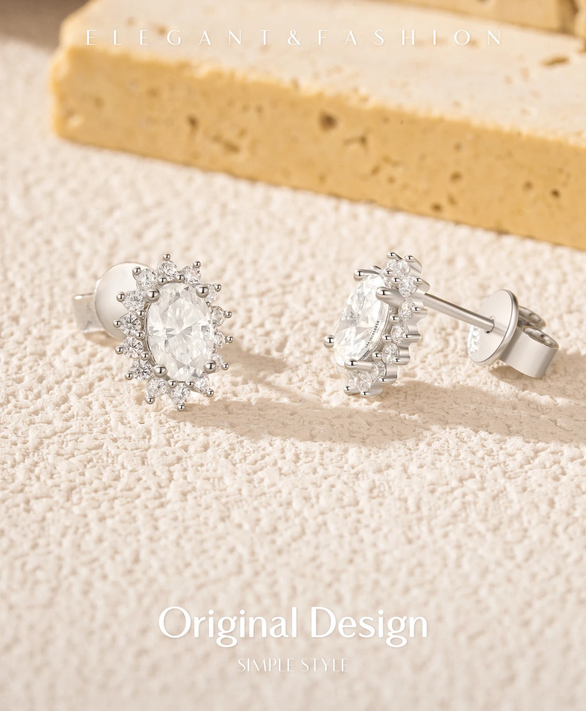 Oval Moissanite Floral Halo Stud Earrings in Sterling Silver - Oval halo angled view