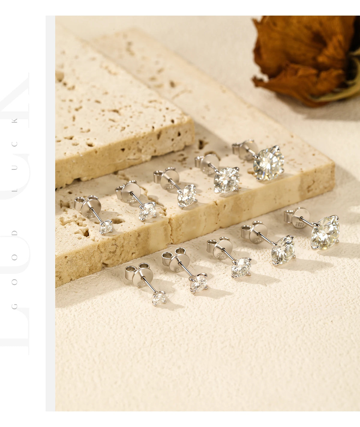 Four-Prong Round Moissanite Stud Earrings in Sterling Silver - Stud pairs in multiple sizes