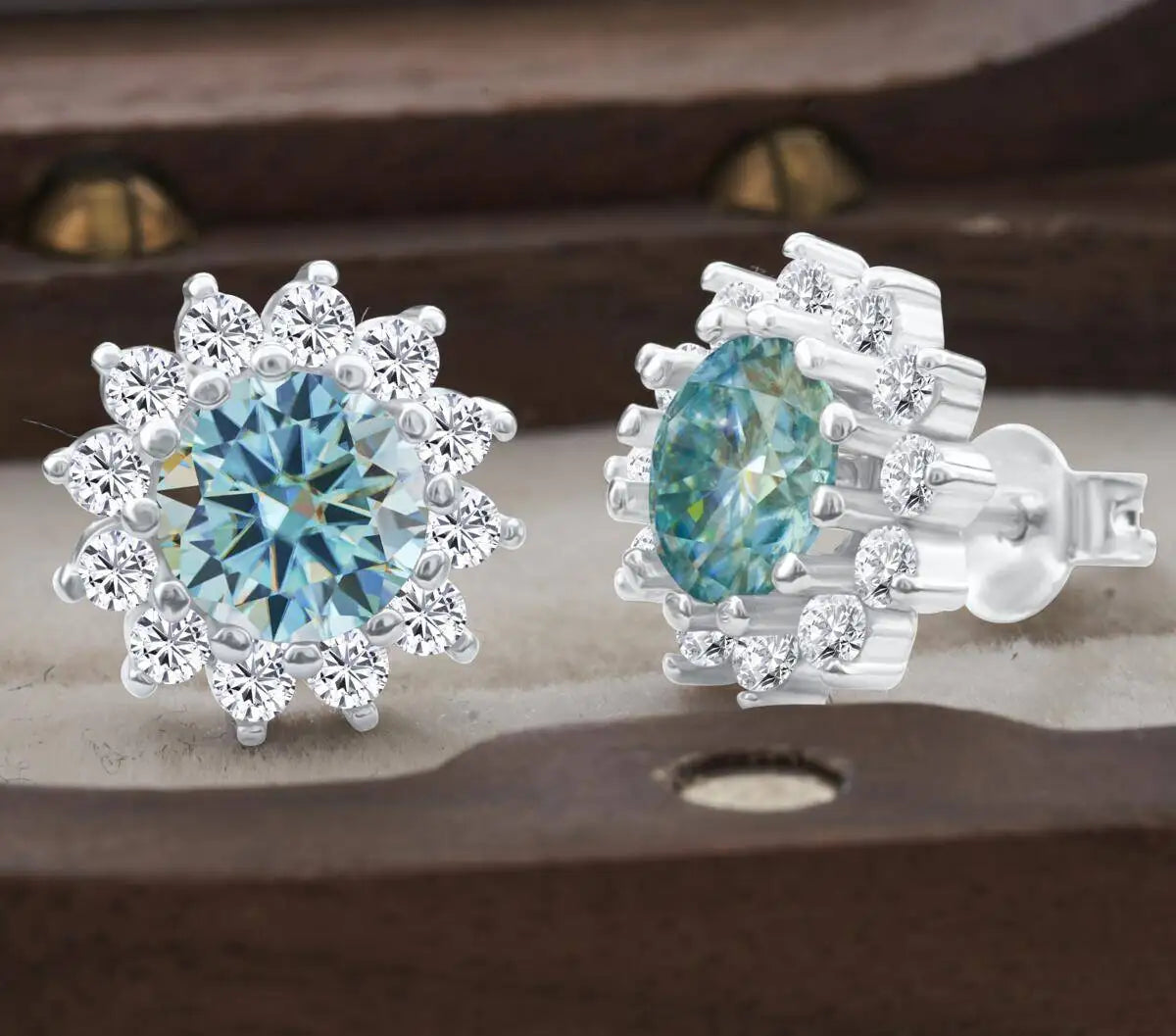 Moissanite Sunburst Halo Stud Earrings in Sterling Silver — Blue sunburst halo close-up — BandsCo Straps