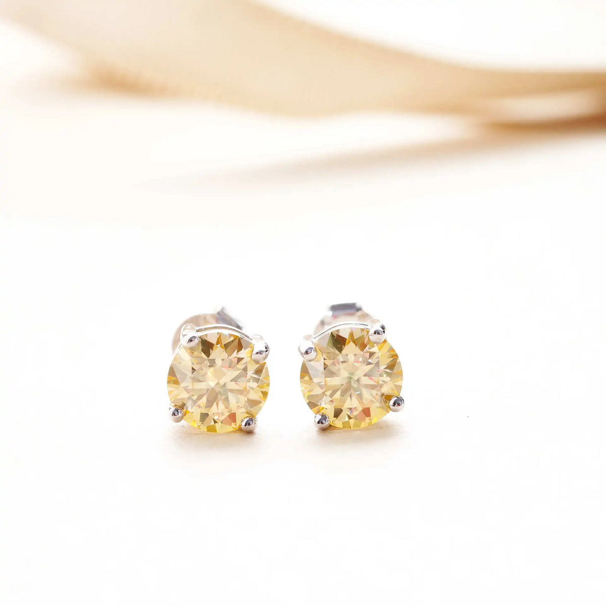 Lemon Yellow Moissanite Stud Earrings in Sterling Silver — Front view