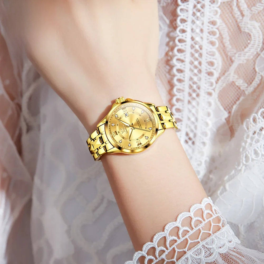 Women's 30mm Bracelet Watch with Date — Gold-tone bracelet watch on wrist