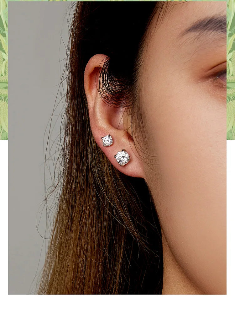 Four-Prong Moissanite Solitaire Stud Earrings in Silver - Two stud sizes on ear