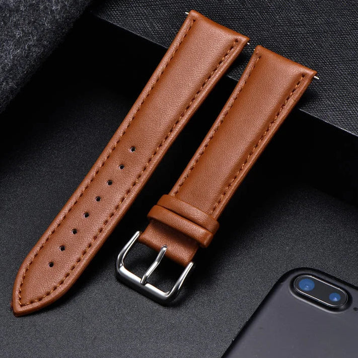 Motorola Moto Watch Band, Soft Calfskin Leather Strap, Steel Buckle on a black surface