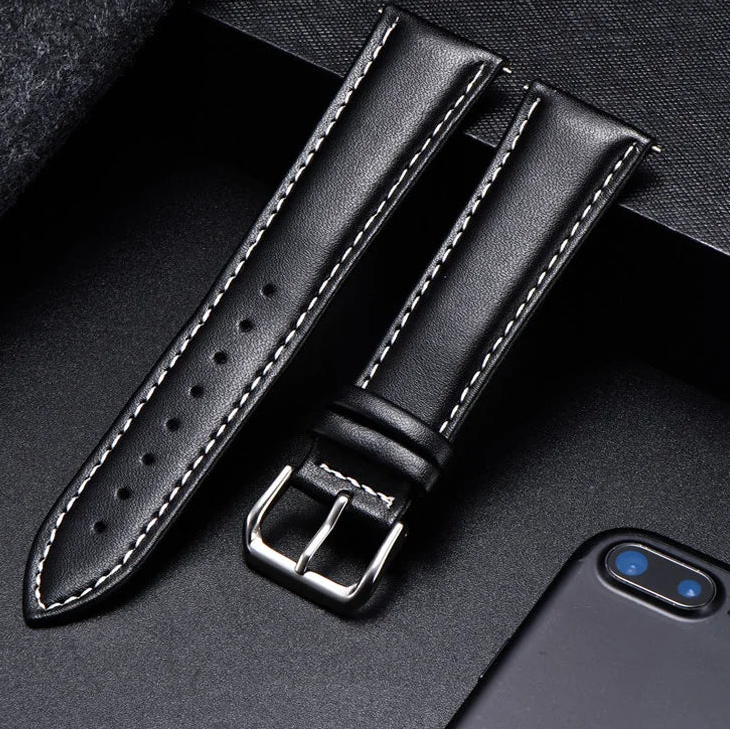 Motorola Moto Watch Band, Soft Calfskin Leather Strap, Steel Buckle on a black surface.