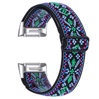 Colorful nylon smartwatch strap for Fitbit Charge 6, featuring a vibrant elastic design and snug fit.