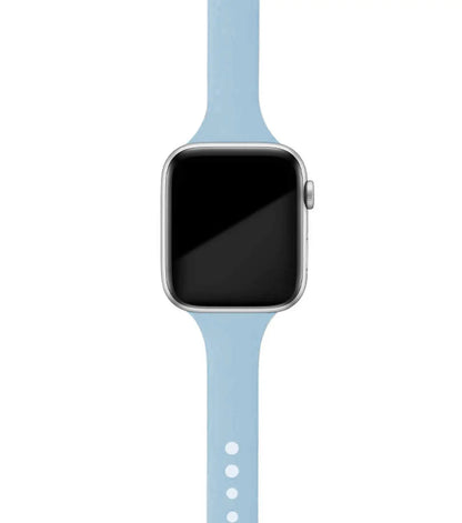 Apple Watch with a light blue silicone band, showcasing its soft and comfortable design for everyday wear.