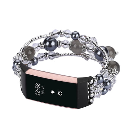 Fashion beaded strap for Fitbit Charge 6, 5, 4, 3, stylish smartwatch band that combines elegance and comfort.