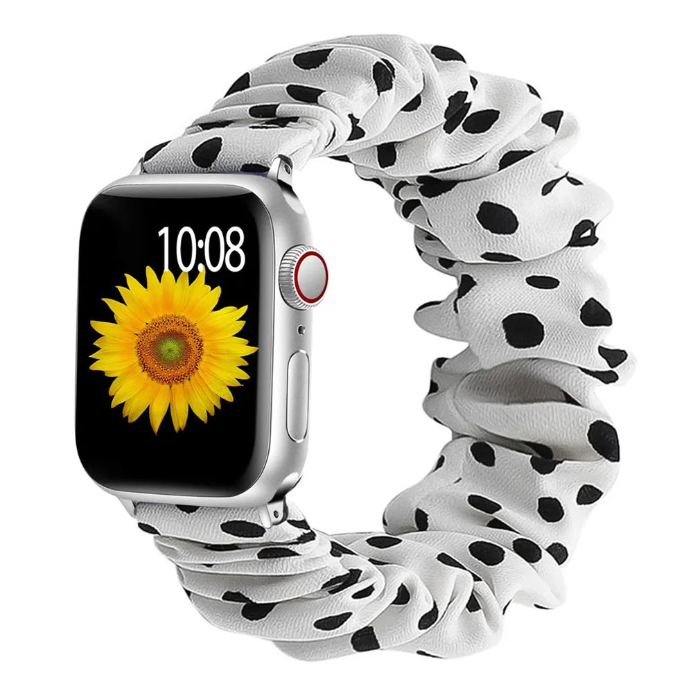 Apple Watch Scrunchie Strap with black polka dots and sunflower watch face, soft elastic nylon loop band.