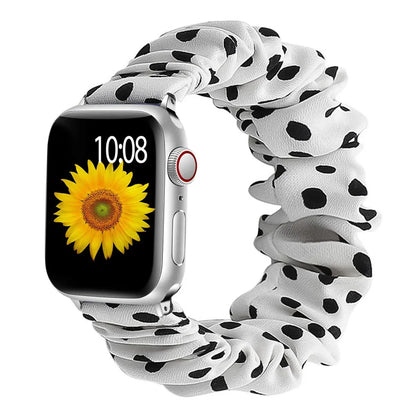 Apple Watch Scrunchie Strap with black polka dots and sunflower watch face, soft elastic nylon loop band.